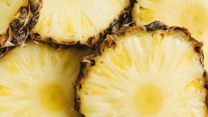 A close-up of cut up pineapples