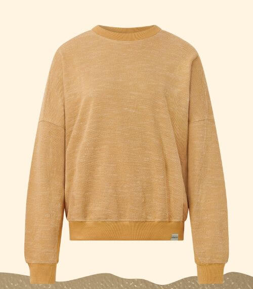 A beige jumper made from plant wool