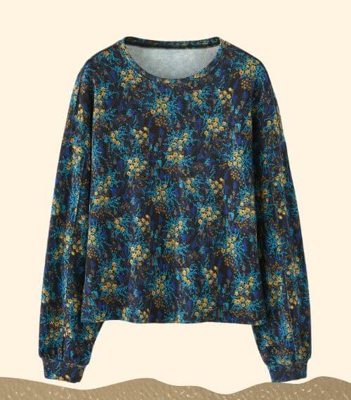 A dark blue patterned jumper made of plant wool from Wrap London