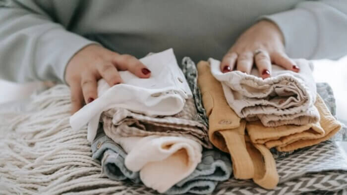 A woman folding laundry